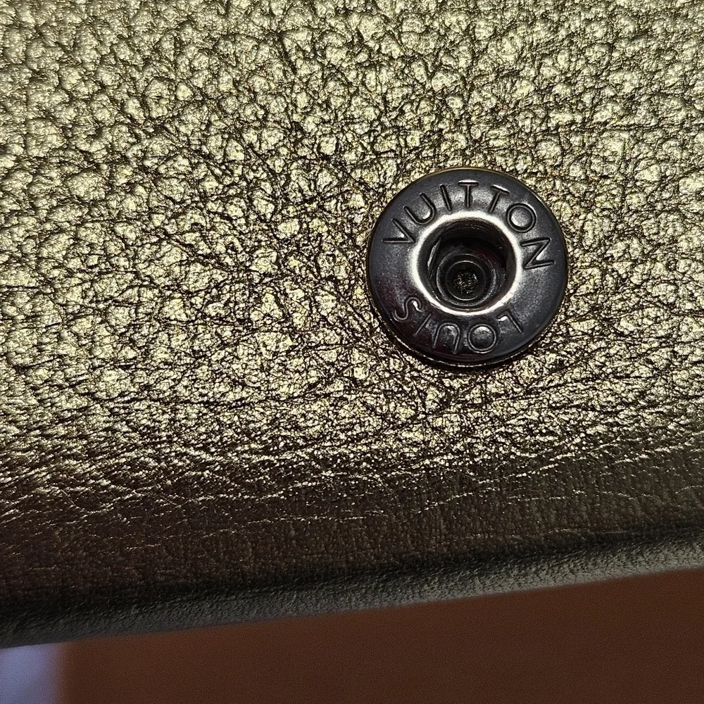 LOUIS VUITTON Portefeuille lock mini Compact Wallet Trifold Leather
